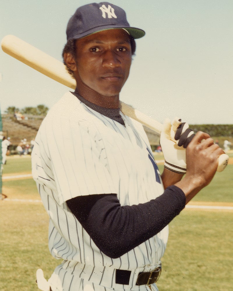 Batting portrait of Otis Nixon in home pinstripe Yankees uniform
